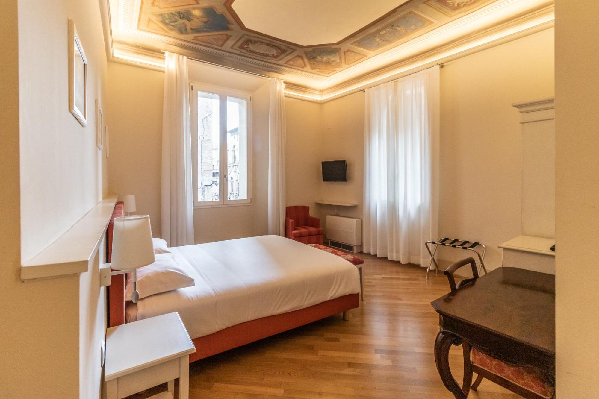 Casa Isolani Luxury Rooms Piazza Maggiore 1 Болонья Экстерьер фото